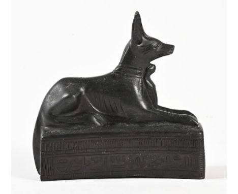 An Egyptian stone carving of Anubis. Length 17 cm. Not a stone carving but a resin carvingIn our opinion the figure is modern