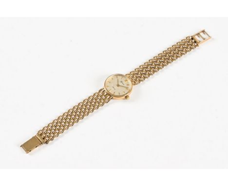 A Geneve 9 ct gold ladies wristwatch, the dial marked Geneve Gold and with baton markers, cased.&nbsp; Diameter +/- 1.9 cm, w