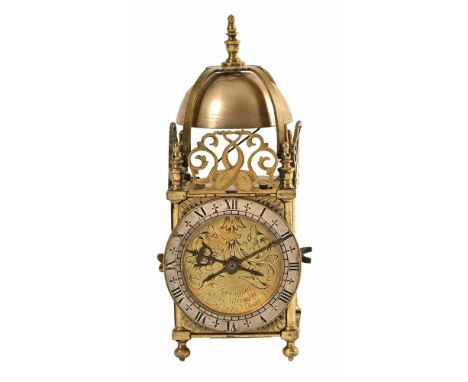 A vintage brass small lantern clock, the dial marked A Fromanteel, complete with key.  Height 23 cm.