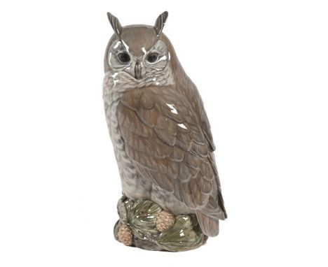 A Royal Copenhagen large model of a long eared owl, by Peter Herold, marked to the underside 1331.  Height 35 cm.