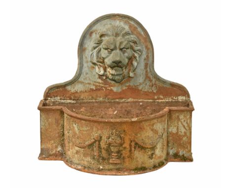 A cast iron garden planter, with lion mask and vase and swag decoration. Height 66 cm, width 69 cm, depth +/- 35 cm (see illu