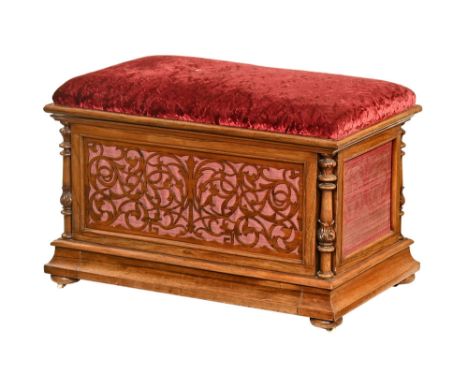 A Victorian rosewood piano stool and combined music CWJ, upholstered in a crushed velvet material with fretwork front panel a