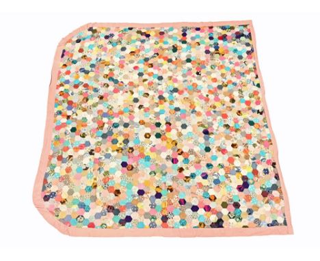 A 20th century patchwork quilt, made with hexagonal patches.  Length 230 cm, width 249 cm.