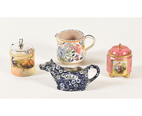 A Locke &amp; Co Worcester preserve dish, a Vienna lidded casket, a Poole jug and Burleigh cow creamer.  Tallest 9.5 cm.