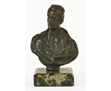 An antique bronze bust of a Roman emperor, raised on a marble plinth.&nbsp; Overall height 12.5 cm.