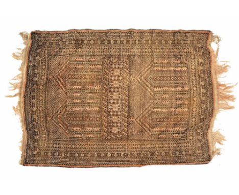 An antique rug, with repeating border and geometric central panel, probably a prayer mat. 137 x 97 cm.