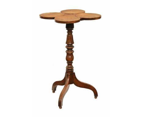 A 19th century mahogany tripod table, with unusual top with four circular segments raised on a turned base and three downswep