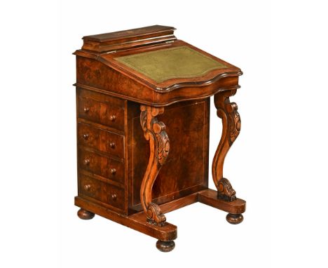 A Victorian style burr walnut davenport, the top with inlaid decoration and a green tooled leather writing surface opening to