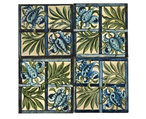 Four Poole pottery William de Morgan design 15 cm tiles (see illustration).All the tiles have been used and so have signs of 