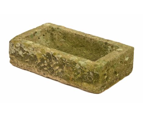A rectangular sandstone garden trough.  Height 18 cm, width 65 cm, depth 36 cm, planting depth +/- 9-10 cm.