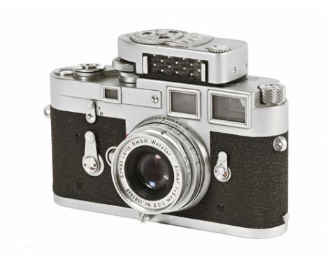 A Leica M3 No. 974 810, with Elmar 50 mm f2.8 No. 1591848 Ernst Leitz lens with Leica Meter and case (see illustration).This 