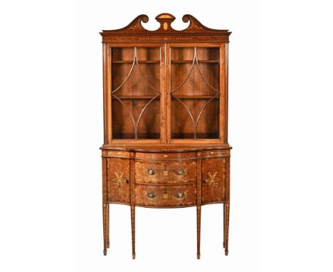 An Edwardian inlaid mahogany display cabinet, with swans neck pediment above a pair of glazed doors with wooden astragals enc
