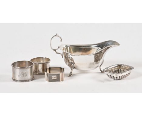 A collection of silver items, to include a sauce boat Birmingham 1940 maker Ernest W Haywood, two silver napkin rings, a silv