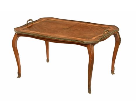A late 19th/early 20th century rosewood and crossbanded coffee table, with brass carrying handle to either side and raised on