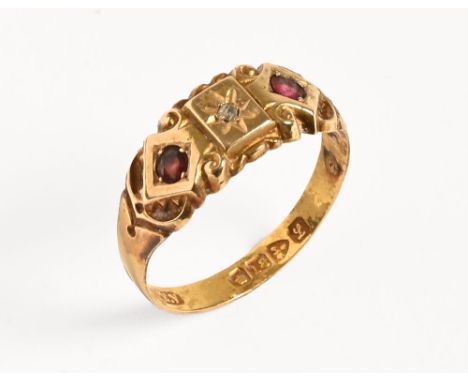 An early 20th century 18 ct gold diamond and ruby ring, Chester hallmark 1911.  Size P.