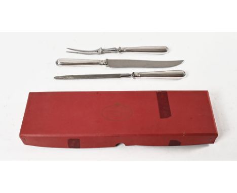 Garrard &amp; Co Ltd 112 Regent Street London a three piece carving set, comprising carving knife, steel and fork, with silve