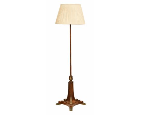 A lamp standard, the base with gilt decoration and raised on three brass feet (possibly converted from a pole screen). Height