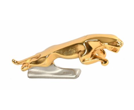 A pewter Jaguar motor car mascot.  Length 13 cm. 