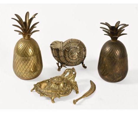 A silver plated spoon warmer in the form of a shell, together with two 20th century brass pineapple ice buckets and a Victori