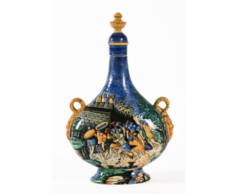 A 19th century Richard Ginori Italian Art Pottery Pilgrim bottle, decorated with a battle scene. Height 39 cm.  The finial ha