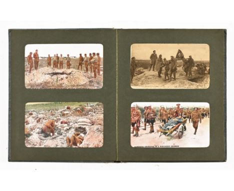 A vintage postcard album, containing a quantity of First World War military postcards and others (32).