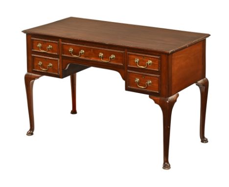 A good quality Edwardian mahogany desk/dressing table, with central drawer flanked on either side by two short drawers all wi