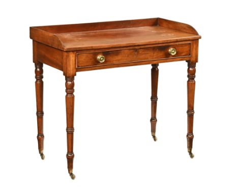 A 19th century mahogany hall or console table, with singular drawer on tapering turned legs ending in castors.  Height 82 cm,