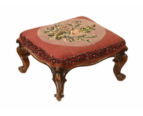 A Victorian mahogany rectangular footstool, with beadwork top and cabriole legs terminating in scroll feet.  Height 20 cm, to