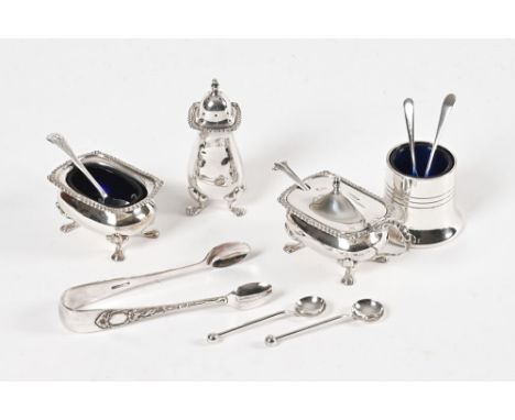 A three piece silver salt pepper and mustard set, makers mark JR Birmingham 1957, together with six silver mustard spoons and