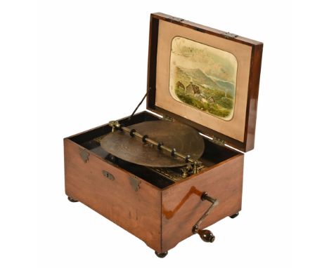 A 19th century brass bound Monopol table top disc musical CWJ.&nbsp; Disc diameter 30 cm, dual comb.&nbsp; Case dimensions 25