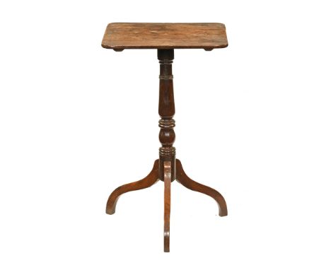 A 19th century mahogany rectangular tripod table, with fixed top turned column and three downswept legs.  Height 71 cm, top 4