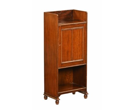 A mahogany small cupboard with shelf and aperture below, raised on short bun feet.  Height 89 cm, width 36 cm, depth 24 cm.