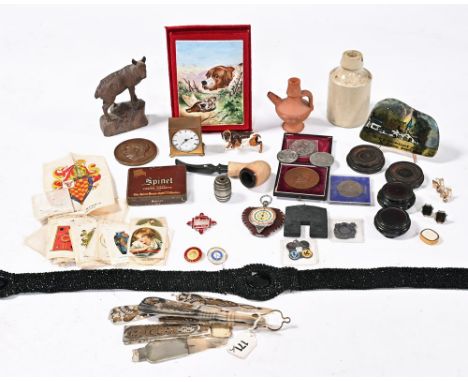 A collection of late 19th/early 20th century artifacts, Austrian Cold painted bronze dog, a bronze Baron Leys 1868 medal, a f