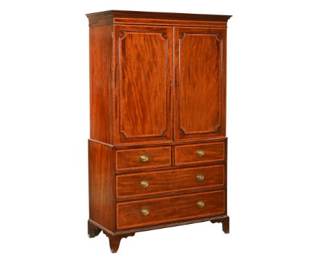 A Heal &amp; Son London late Victorian inlaid linen press, with a pair cupboard doors with open hanging section internally fo