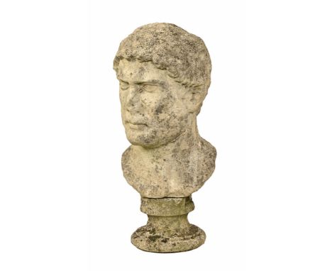 A reconstituted stone bust of a gentleman.  Height +/- 45 cm. 