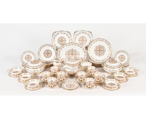 A Tuscan fine bone china Richelieu gilt and hand painted scroll patterned dinner service.  Three of the soup bowls have crack