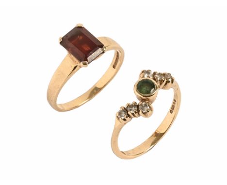 A 9 ct gold diamond and emerald ring, together with a 9 ct gold garnet ring.  Gross weight 4.55 grams.