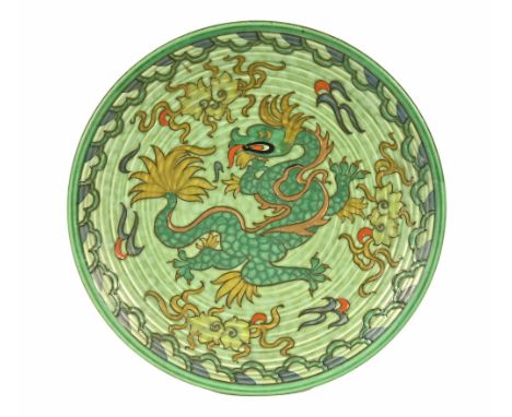 A Crown Ducal Charlotte Rhead signed dragon plate, green and gilt. diameter 31.5 cm.The  plate is in very good condition.  We