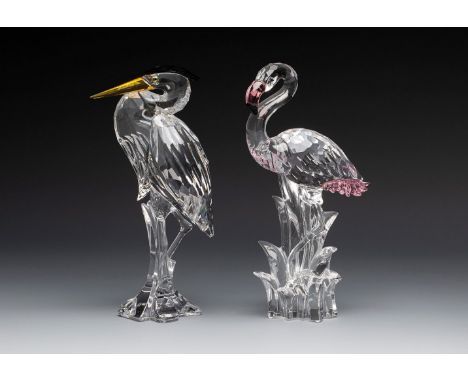 SWAROVSKI. Austria, late 20th century."Flamingo" and "Grey Heron".Two figures in faceted Swarovski crystal in various shades.