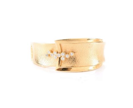 14 Karat Yellow Gold and Ten (10) Round Brilliant Cut Diamond Cuff Bangle Bracelet. Stamped Sonia B 14K. Measures 1" W, 2-1/8