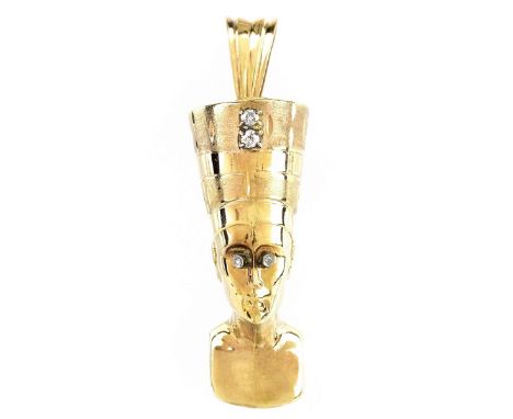 Vintage 14 Karat Yellow Gold and Diamond Cleopatra Pendant. Unsigned. Measures 2-1/2" H, 5/8" W. Approx. weight: 14.4 grams. 