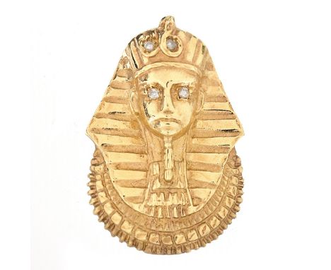 Vintage 14 Karat Yellow Gold and Diamond King Tutankhamun Pendant. Stamped 14K. Measures 1-5/8" H, 1-1/8" W. Approx. weight: 