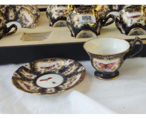 A good royal Worcester set of 6 cups and saucers painted with butterflies