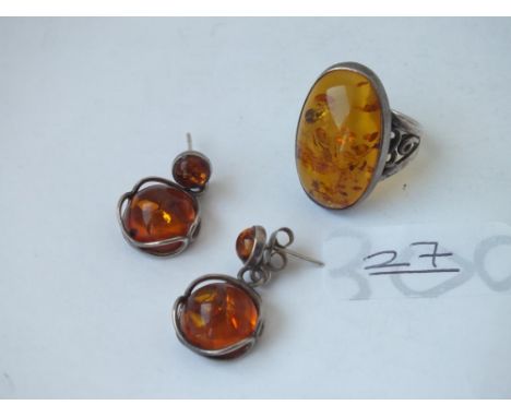 A pair of silver &amp; amber circular ear pendants with silver &amp; amber ring
