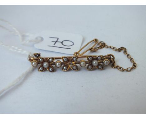 A gold mounted seed pearl bar brooch - 3.4gms