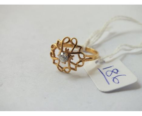 A stone set ring in 9ct - size N 