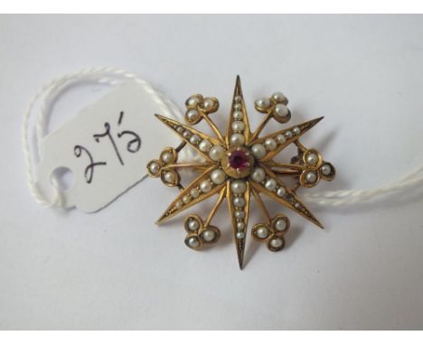 A Victorian ruby &amp; pearl star brooch in 9ct - 3.8gms