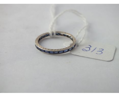 A white gold sapphire eternity ring (stones missing) - size K 