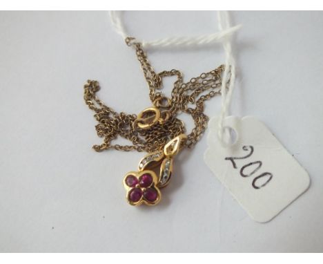 A ruby &amp; diamond pendant necklace in 9ct - 2.5gms