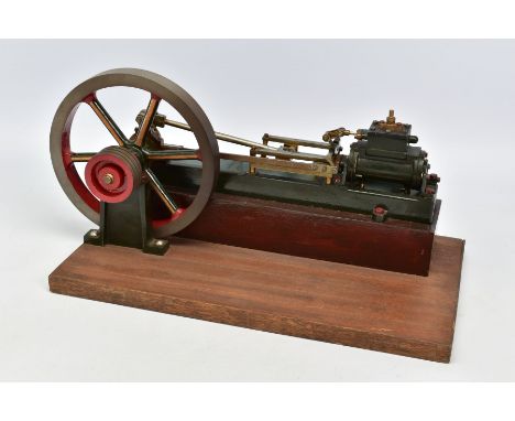 AN UNMARKED HORIZONTAL SINGLE CYLINDER LIVE STEAM ENGINE, not tested, kit built ?, diameter of flywheel approximately 18cm, a